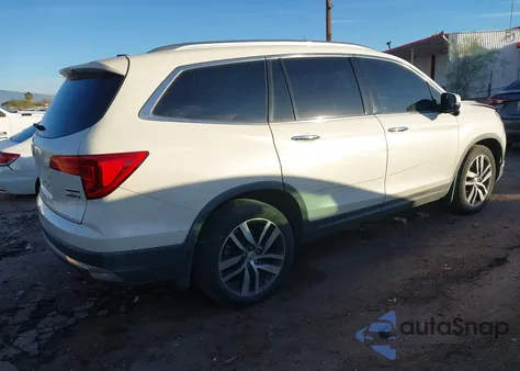 2017 Honda Pilot Touring z USA, uszkodzony, nr VIN 5FNYF6H92HB017760